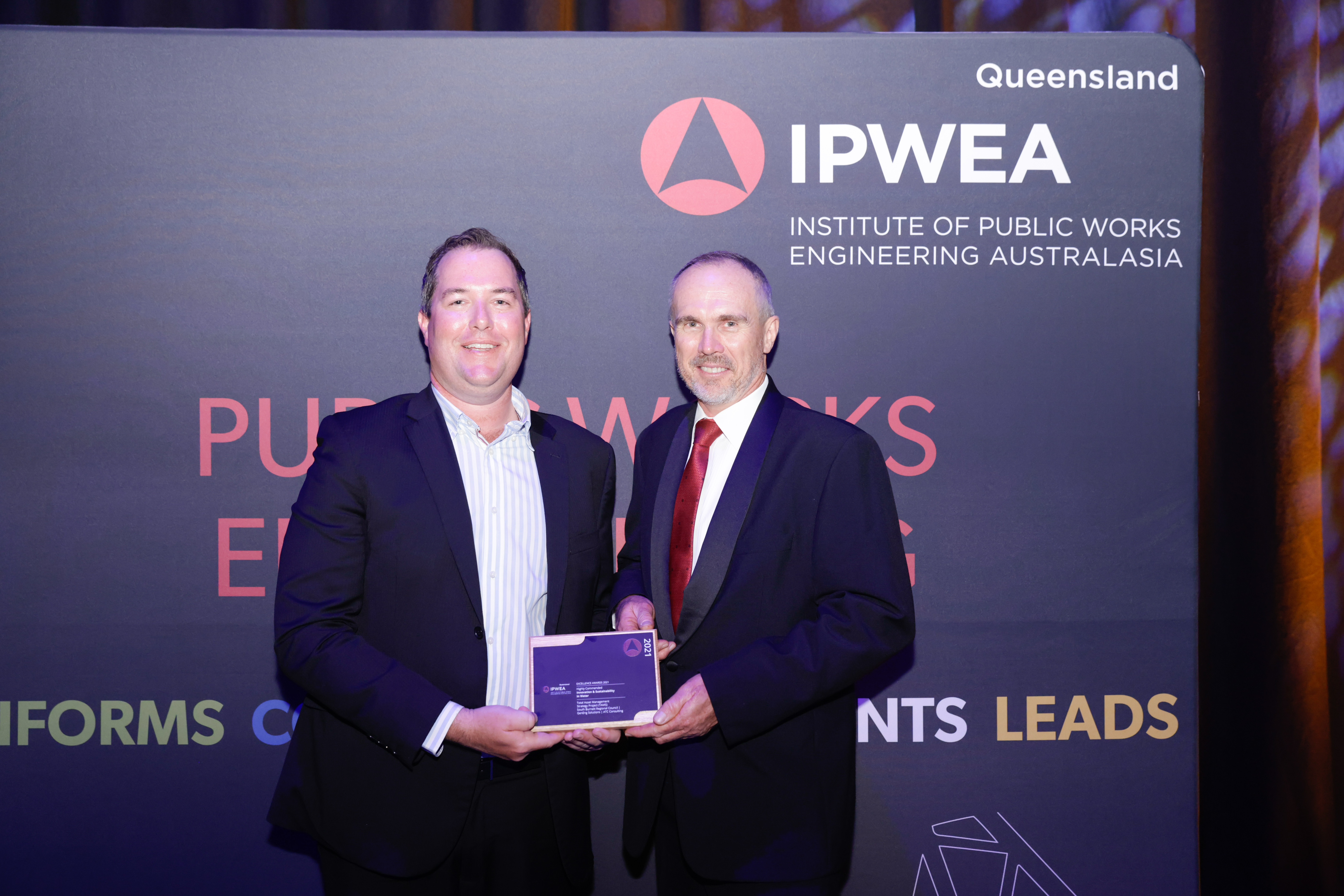 Image (Page 2): South Burnett Regional Council General Manager Infrastructure Aaron Meehan and GenEng Managing Director Ged Brennan at the IPWEAQ 2021 annual conference
